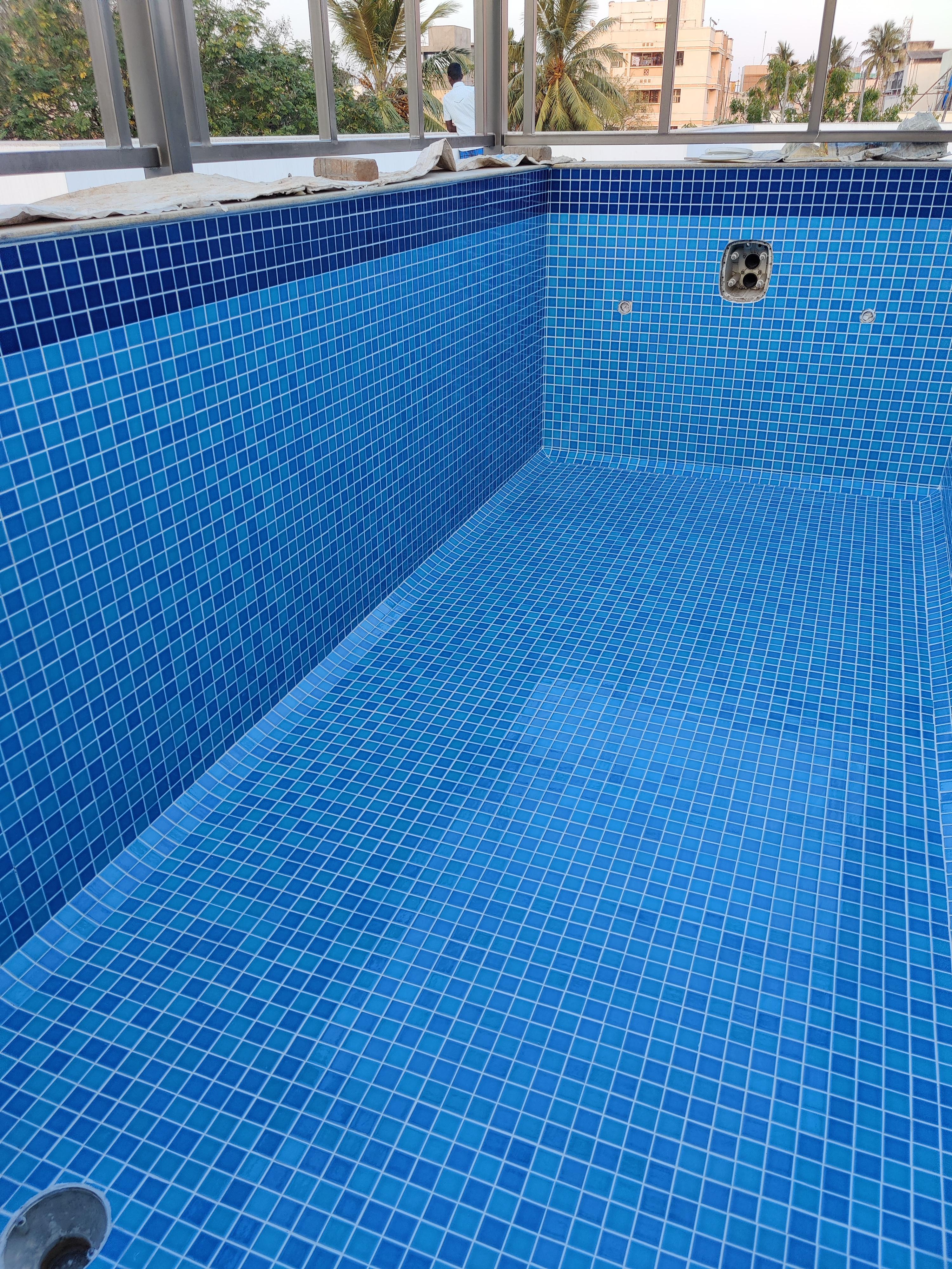 Swimming pool cladding