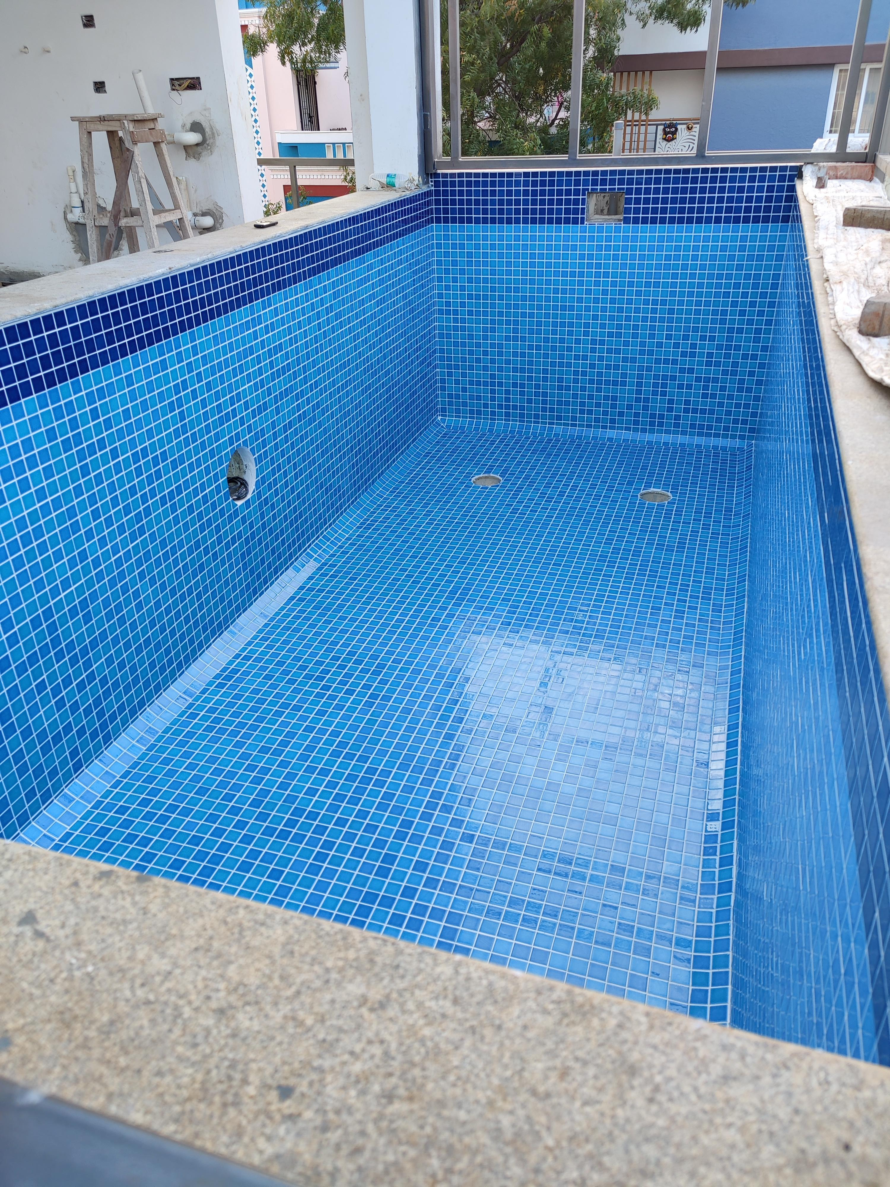 Swimming pool cladding