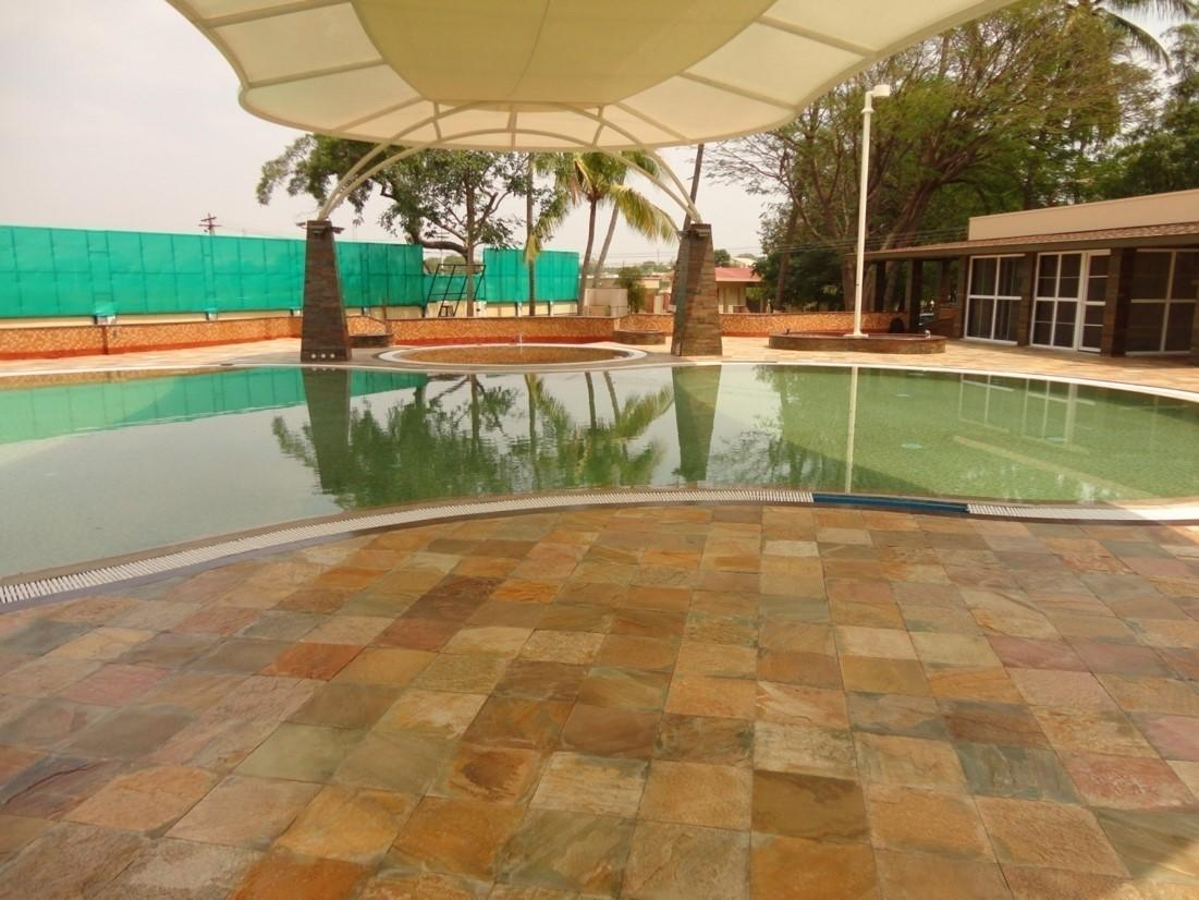 Swimming pool cladding