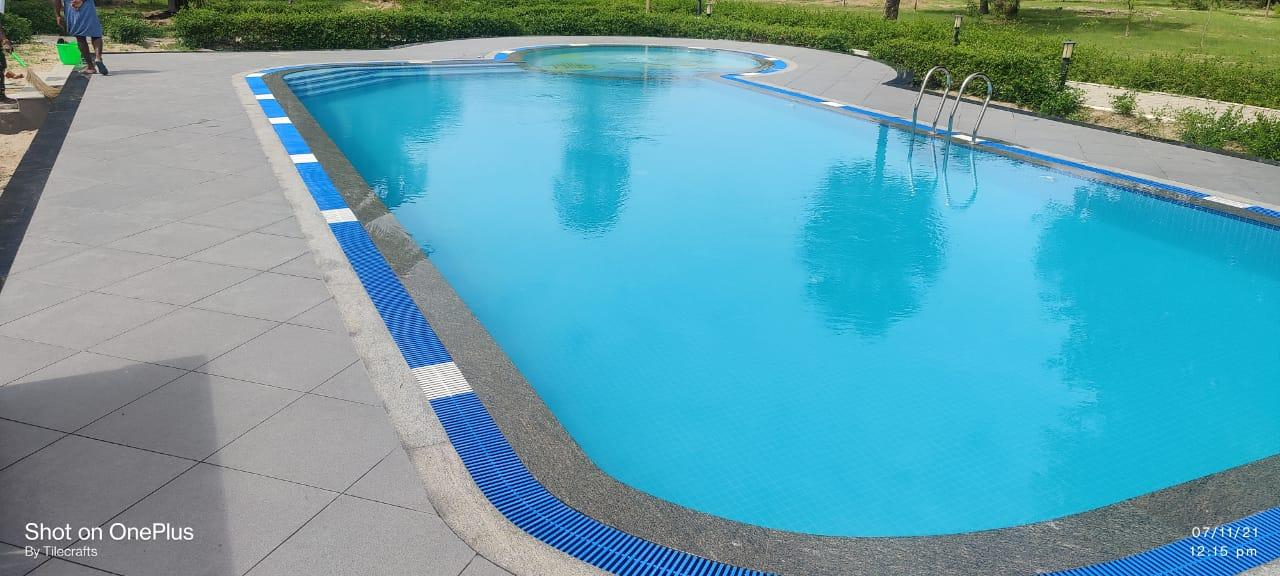 Swimming pool cladding