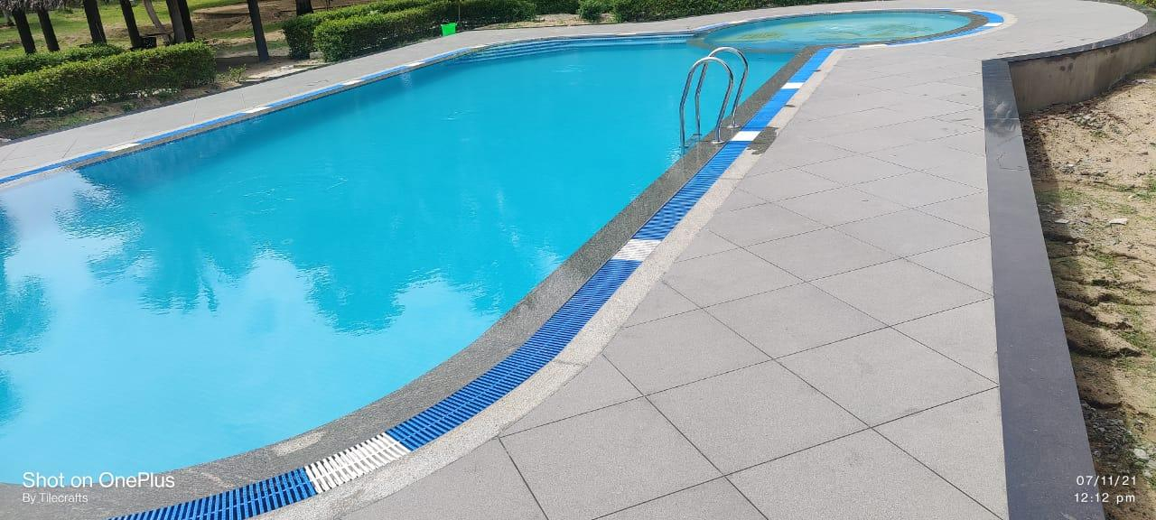 Swimming pool cladding